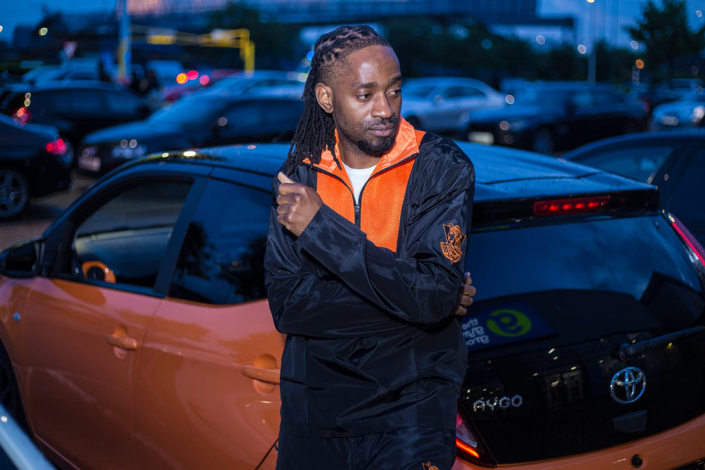 Naut Tekne Mk-1 – Opium Black and Orange Tracksuit