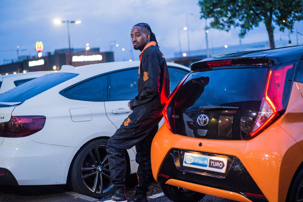 Naut Tekne Mk-1 – Opium Black and Orange Tracksuit